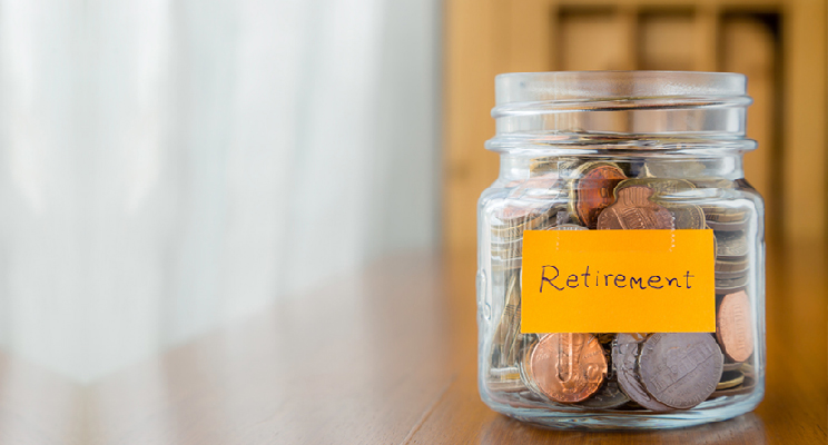 Jar of coins with the words "retirement" written